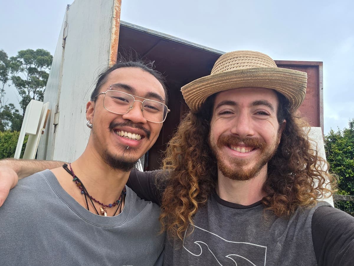 Mayan and Hugo in front of a loaded truck