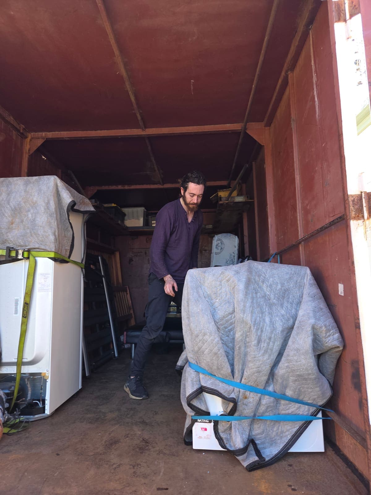 Load padded and tied off inside the truck box